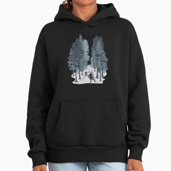 Cross-country skiing, cross country skier and winter forest landscape Hoodie